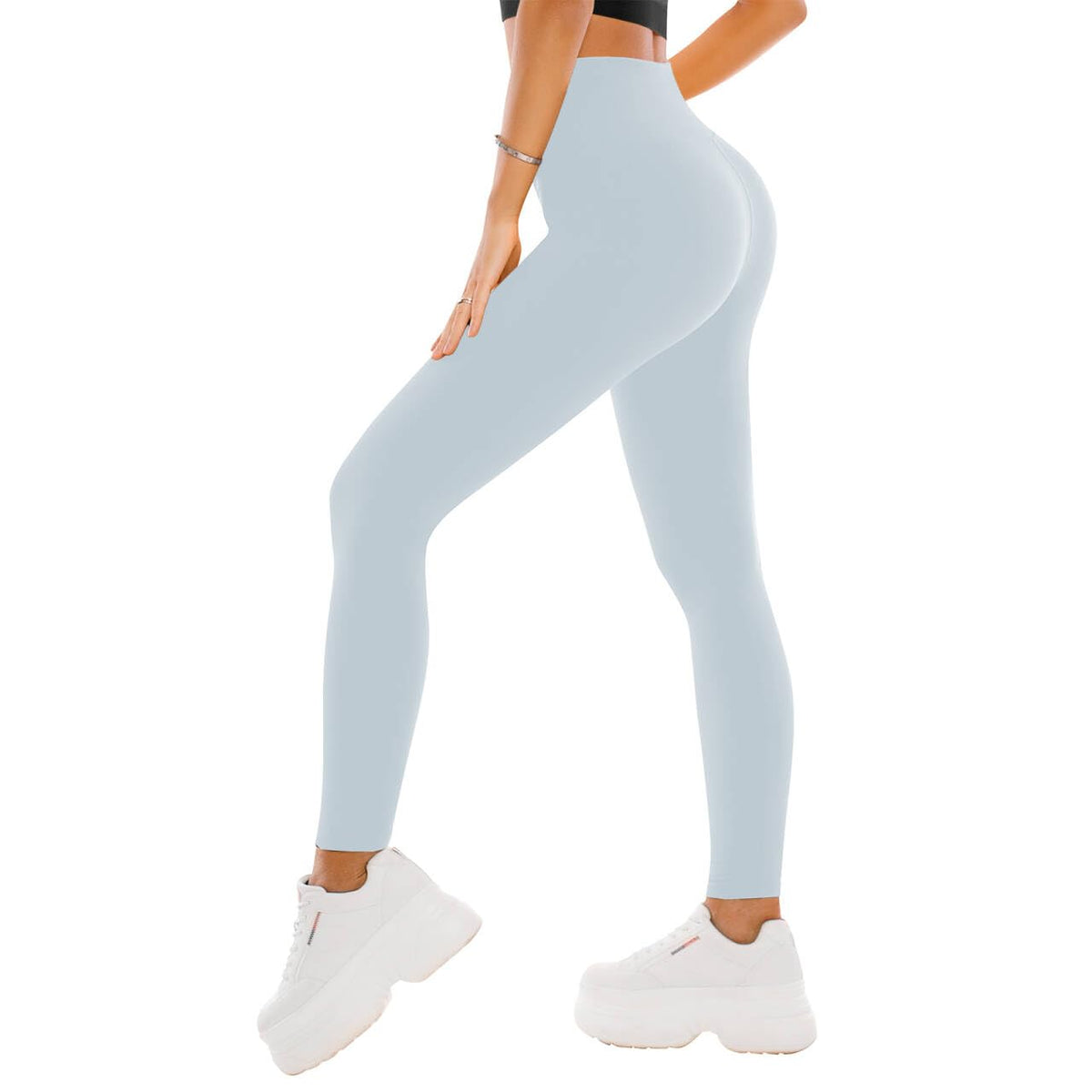 Model walking in full-length high waisted leggings, showing the opaque non-see-through fabric