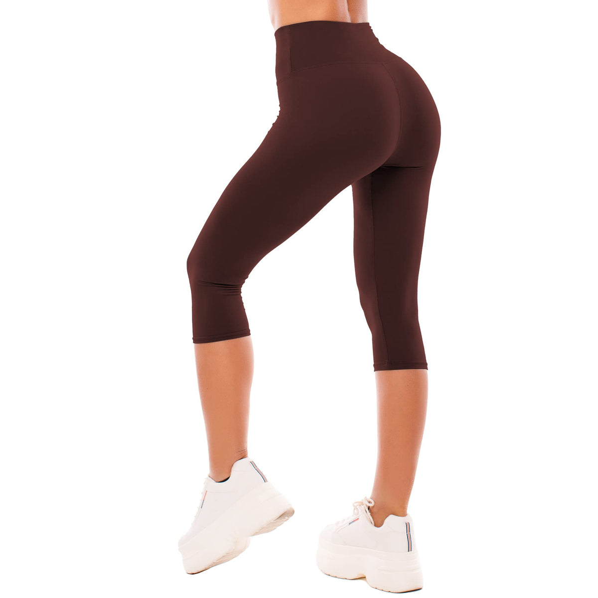 Side view of full-length high waisted leggings, showing the contoured fit through hip and thigh