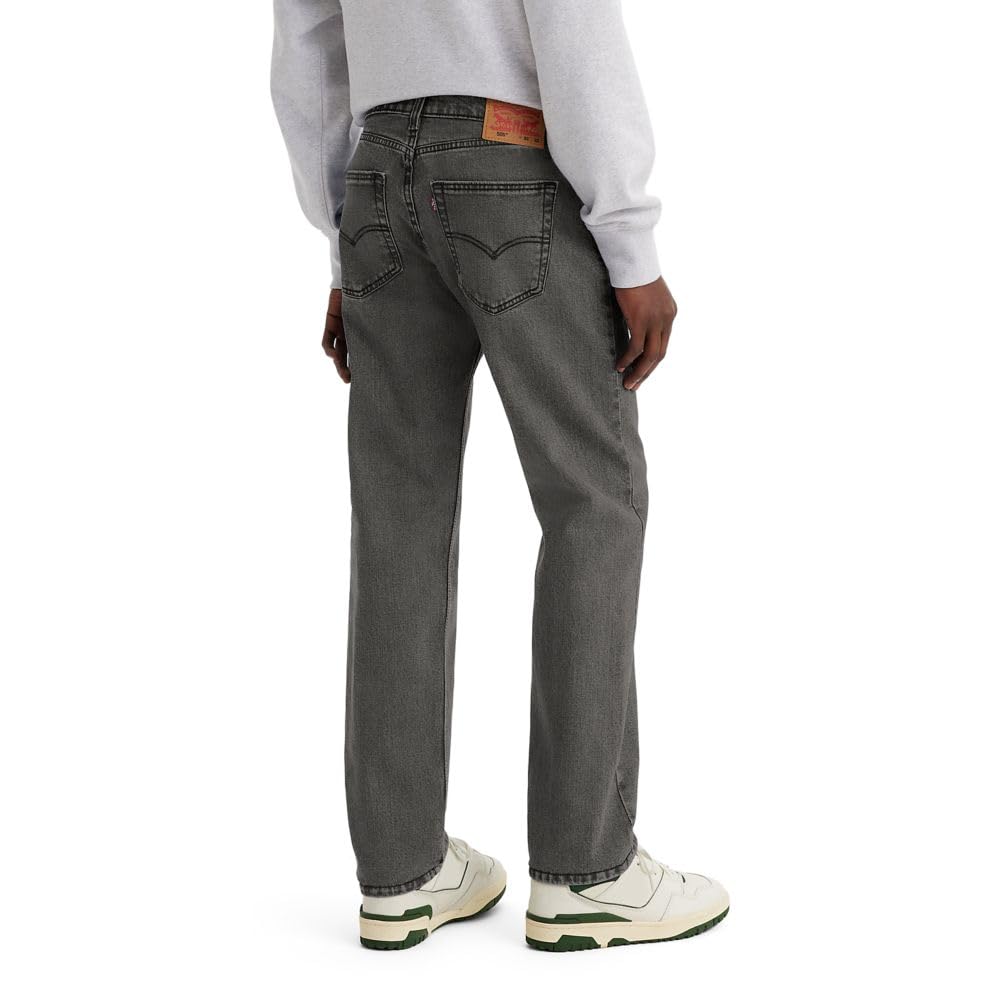 Men's 505 regular fit jeans folded, showing dark indigo denim wash