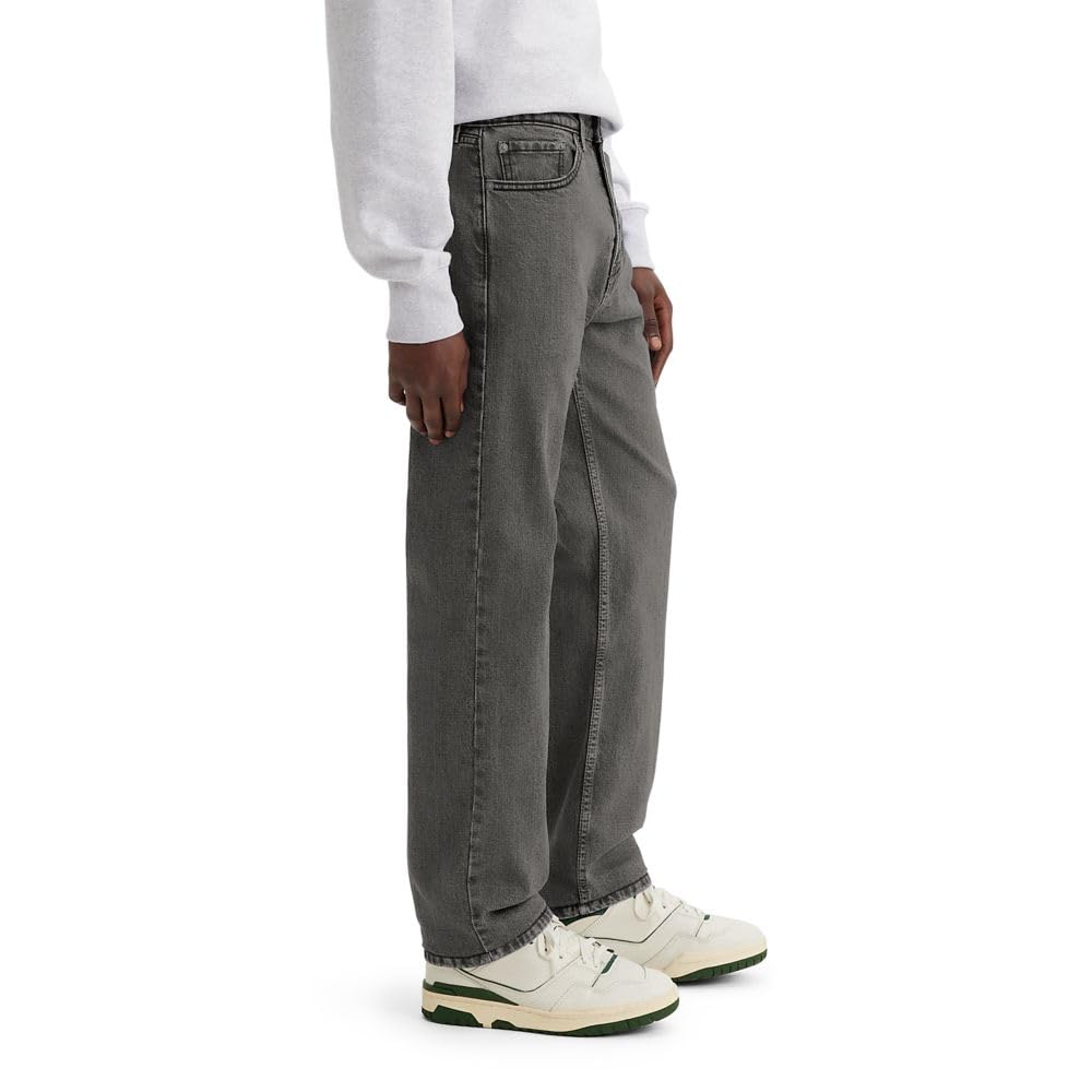 Men's 505 regular fit jeans worn with a casual top, full-length styling shot