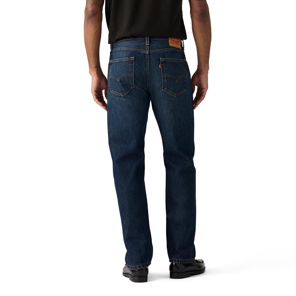 Men's 505 regular fit jeans in dark wash denim, side profile view