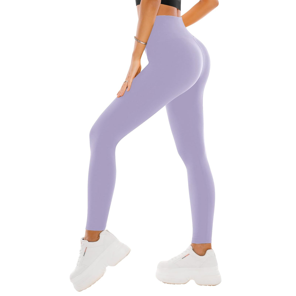 Buttery soft black yoga pants shown from the side, highlighting the smooth full-length leg fit