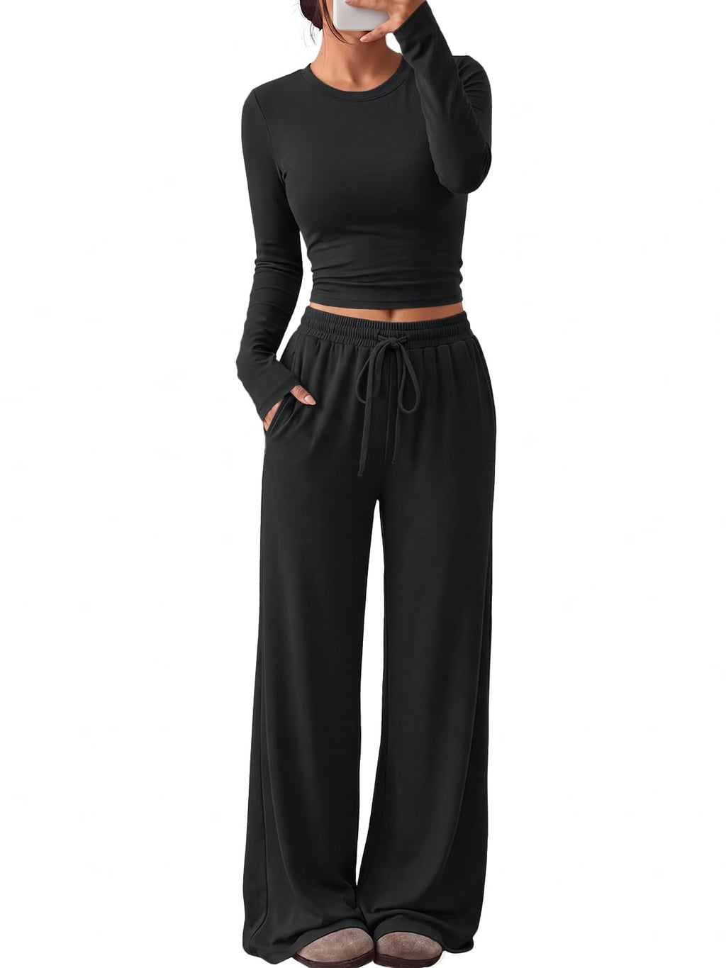 Model wearing the lounge set with arms crossed, upper-body view