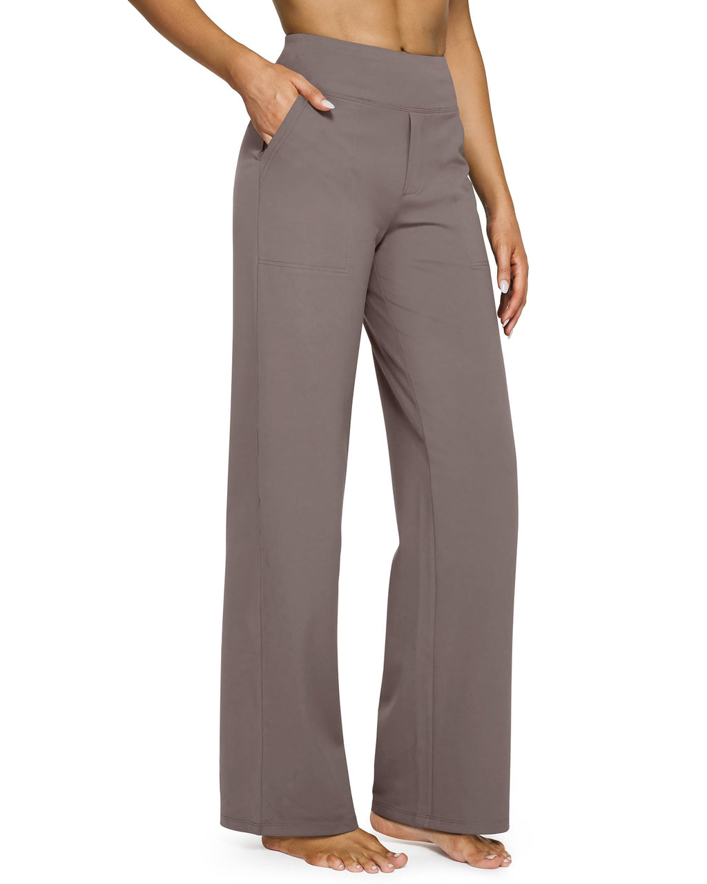 Women's wide leg yoga pants in a seated stretch pose showing comfort and flexibility