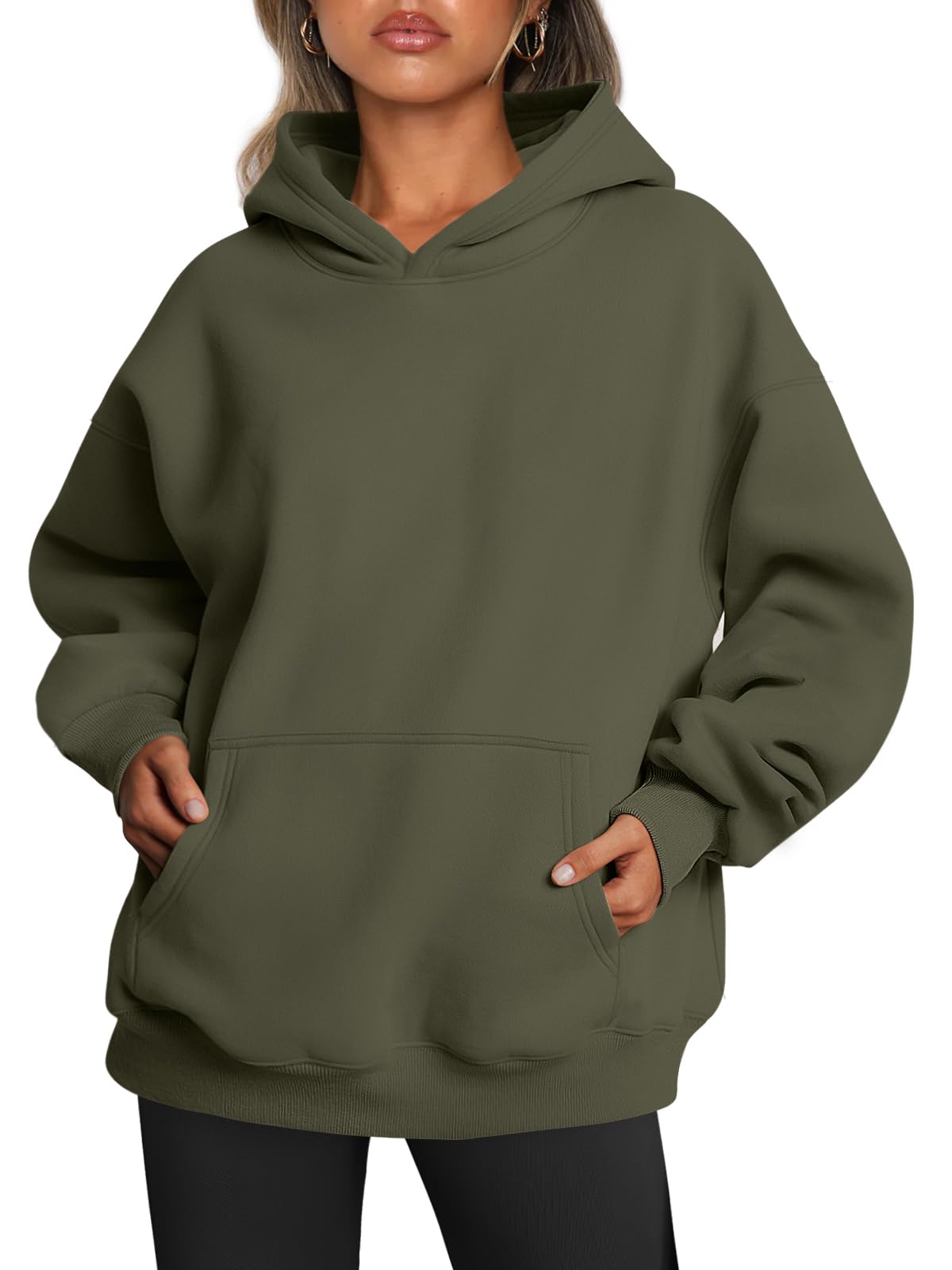 Women's oversized hoodie shown worn with the kangaroo pocket visible
