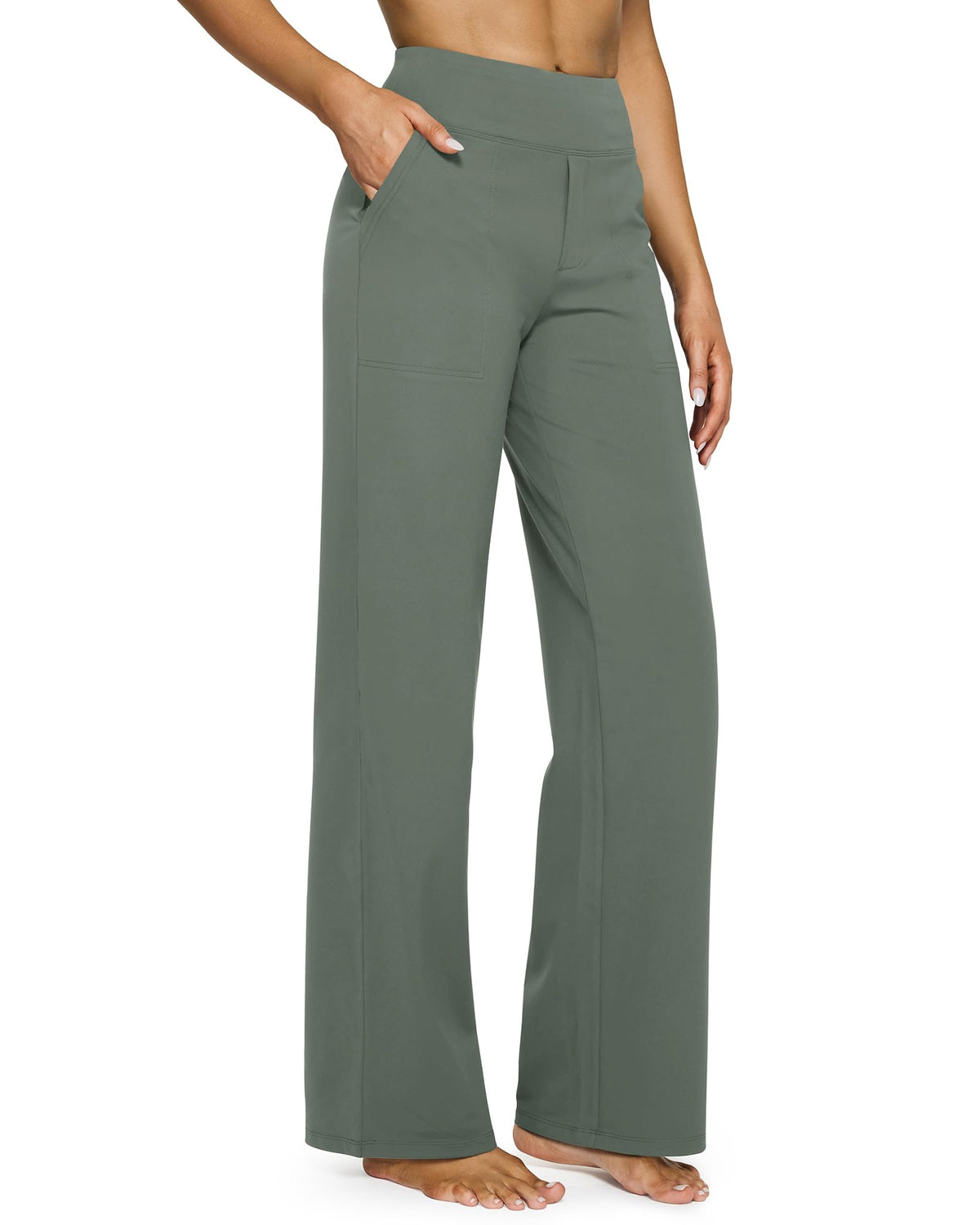 High waisted wide leg pants shown from the side, highlighting the flowy leg and pocket detail