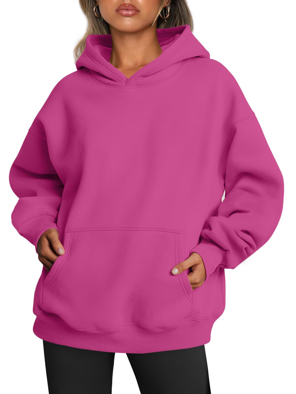 Detail of the hood interior and drawstring eyelets on the oversized sweatshirt