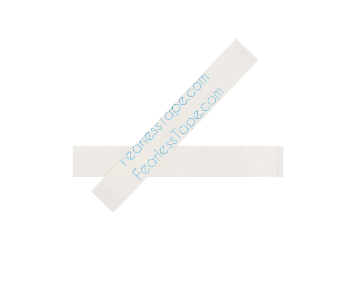 Close-up texture of the clear adhesive on a Fearless Tape double sided strip