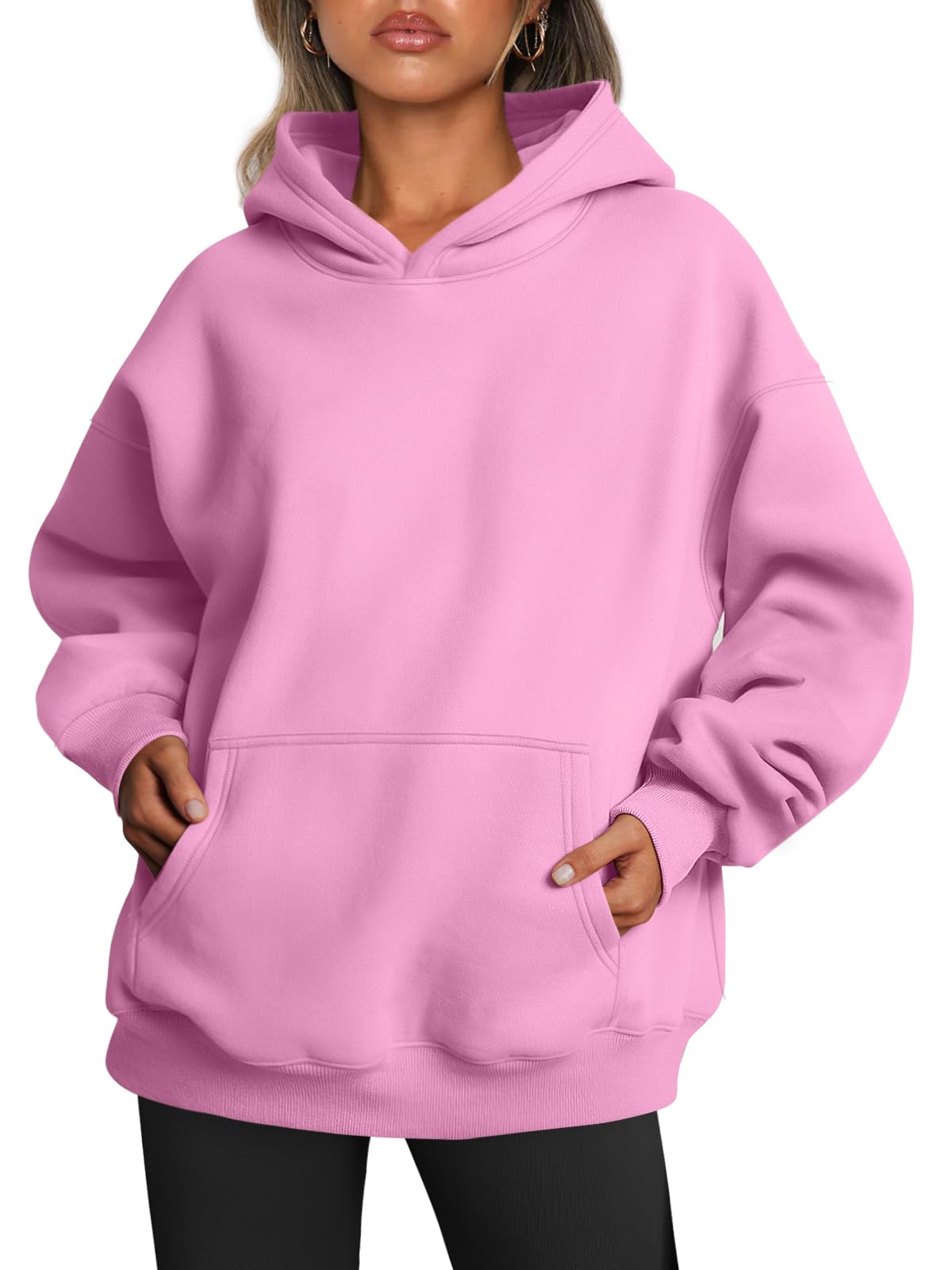 Back view of the women's oversized hoodie showing the plain rear panel and ribbed hem