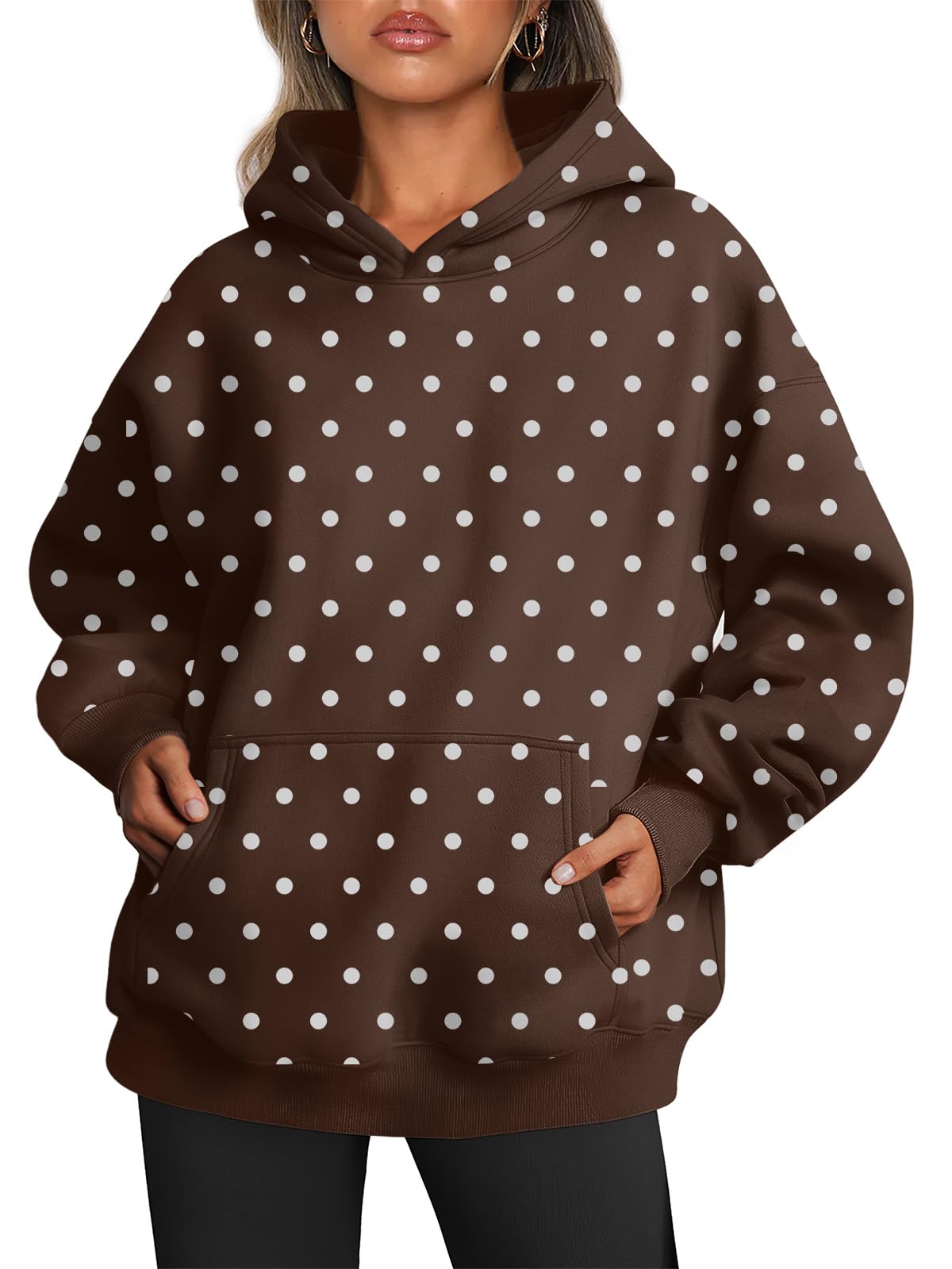 Women's oversized hoodie shown from the rear three-quarter angle highlighting the drape