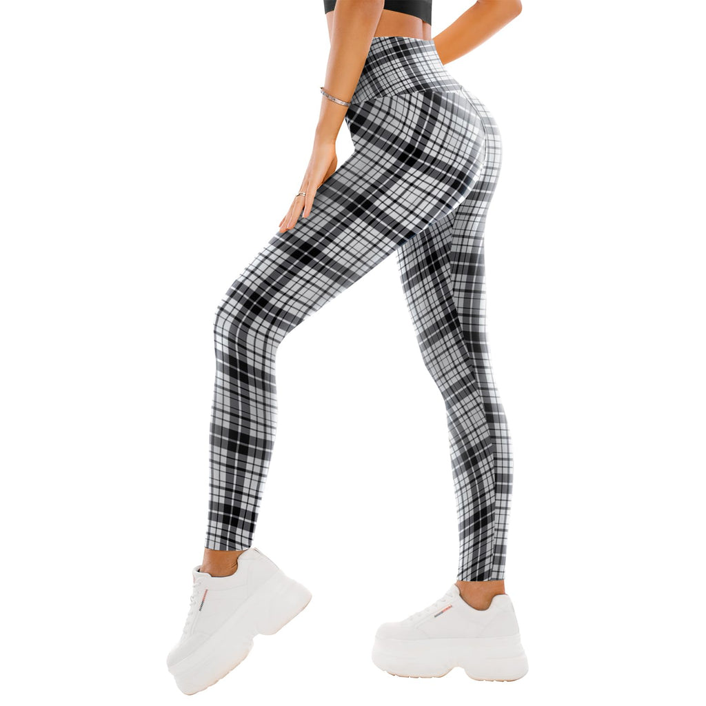 Detail shot of the tummy-control high waistband on the leggings, showing flat seams