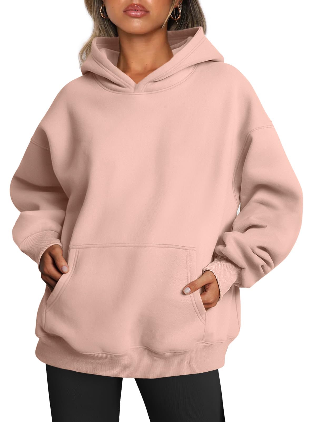 Flat lay of the oversized women's hoodie showing full shape and sleeves