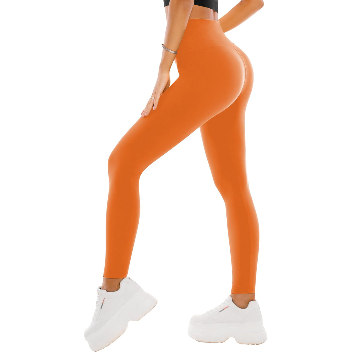 Black leggings shown from the side with the high waistband and full-length leg in view