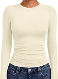 Women's crew neck long sleeve compression shirt shown from the front in a fitted silhouette