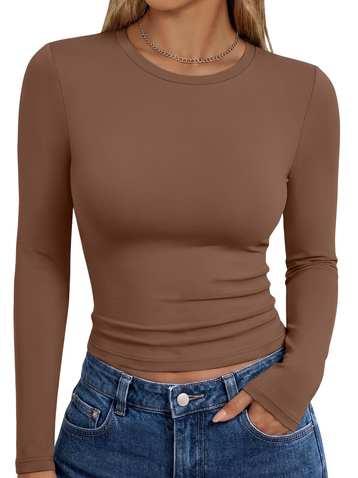 Women's long sleeve top shown in an alternate color, front-facing studio view
