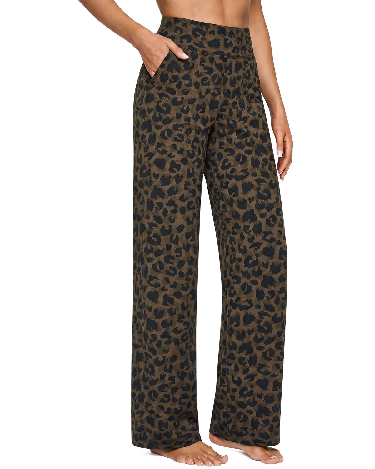 Side angle of high waisted wide leg pants, showing the relaxed silhouette and pocket opening