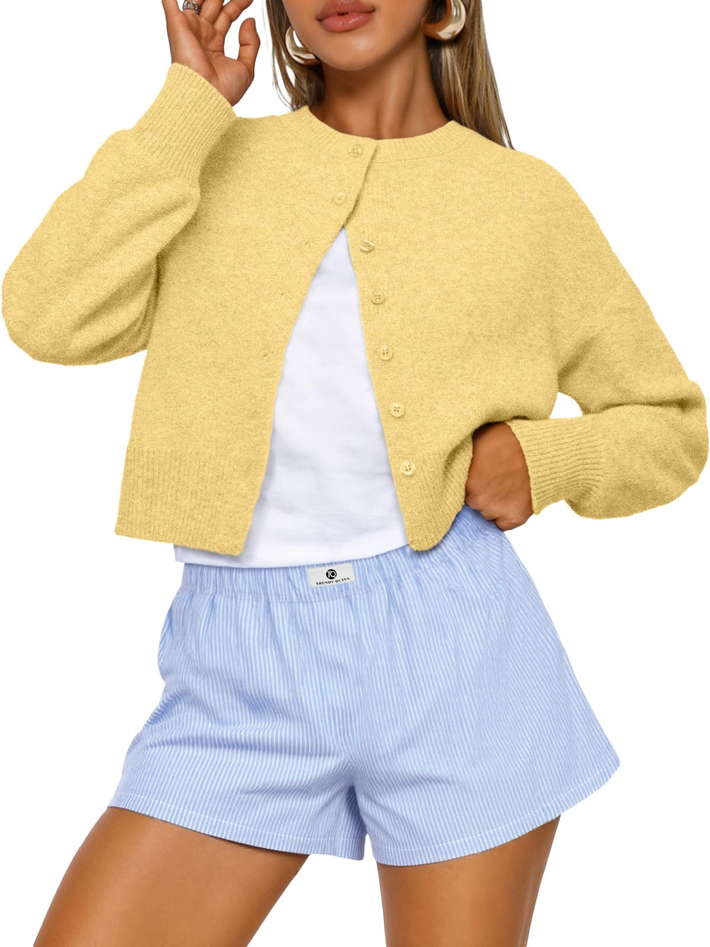 Cropped cardigan styled with trousers for an everyday fall look