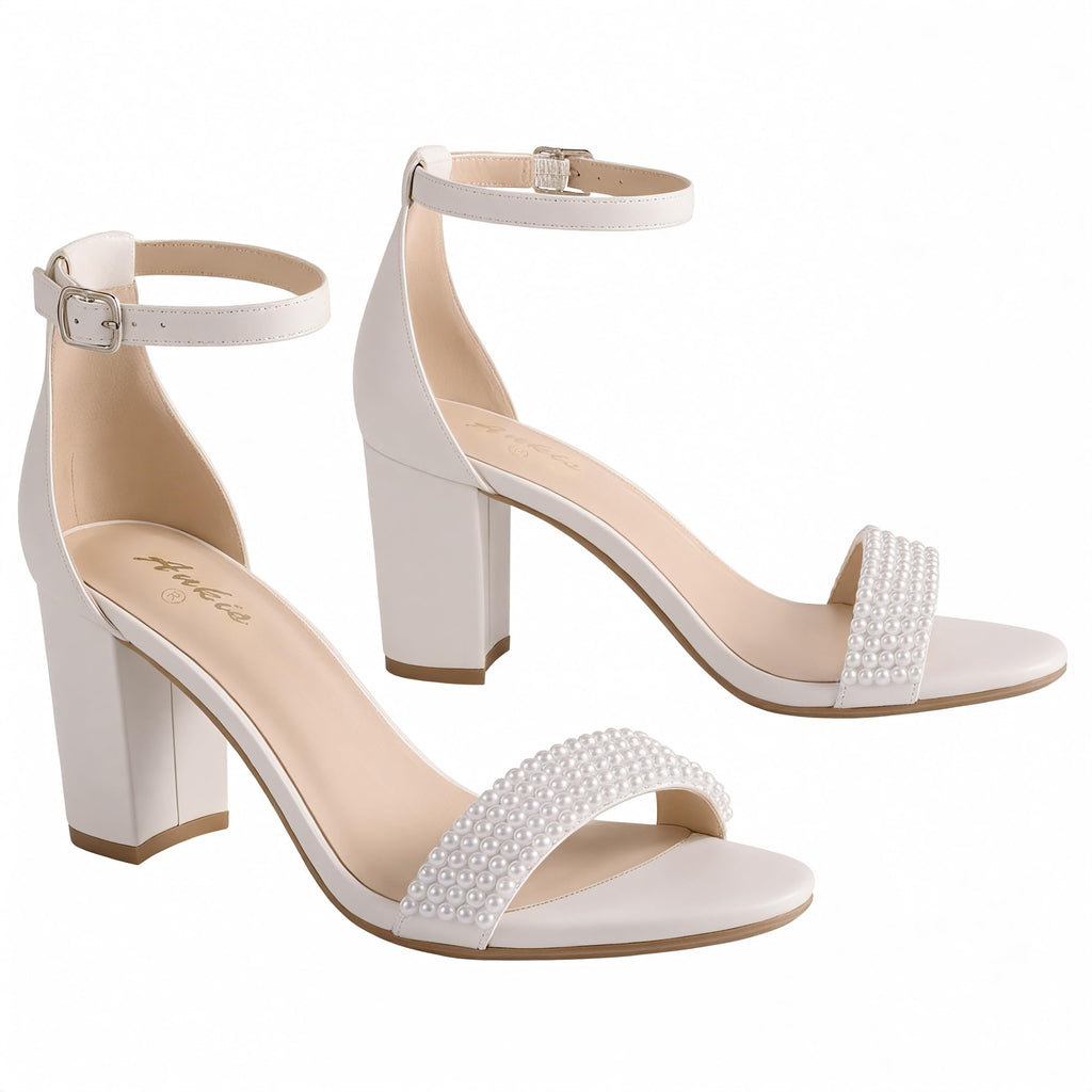 Open toe sandal worn on foot with ankle strap fastened