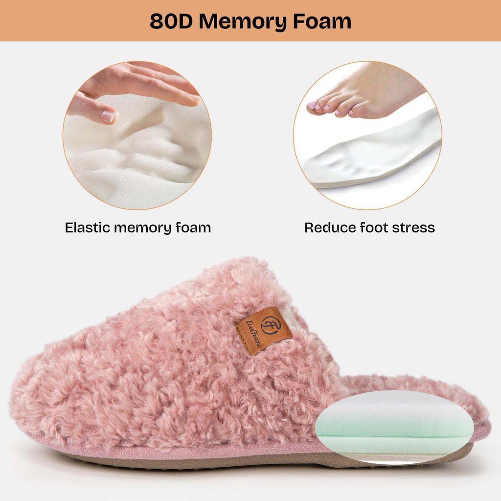Women's memory foam slippers displayed at an angle to show the cushioned indoor sole