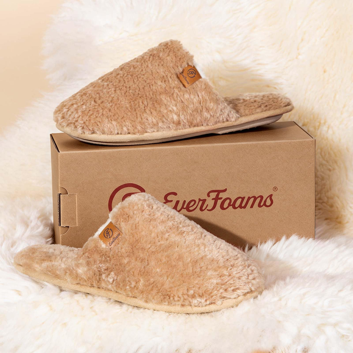 Women's cozy slippers showing the fluffy upper and memory foam insole detail