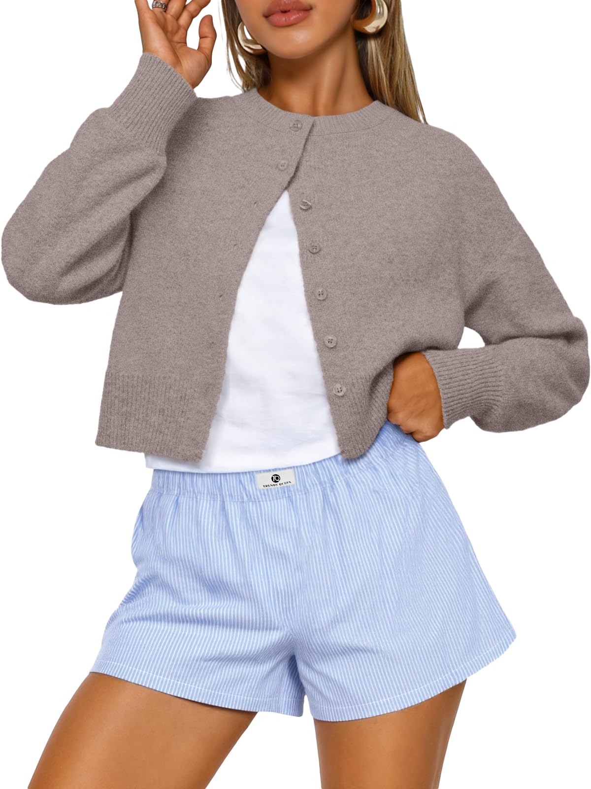 Cropped cardigan worn over a dress showing the relaxed drape