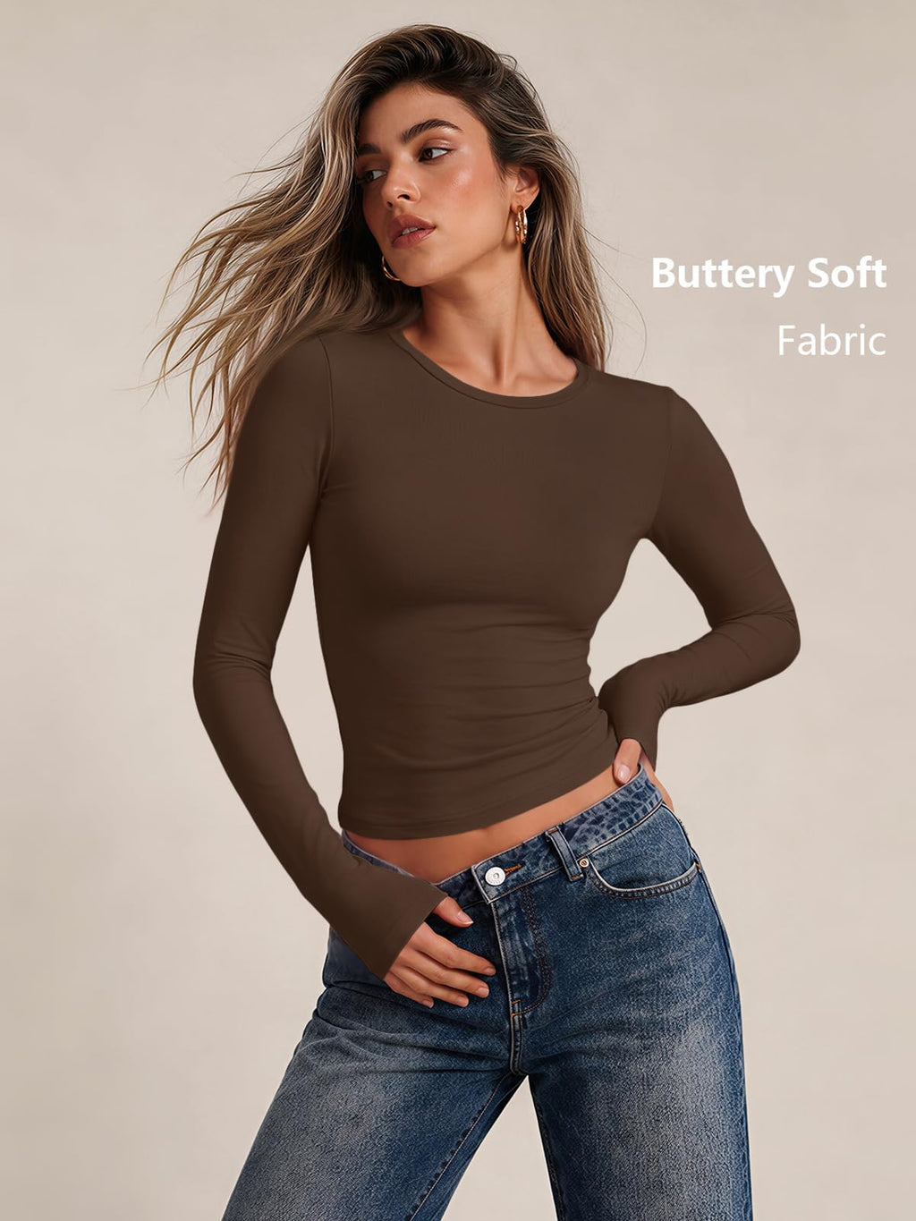 Women's long sleeve compression underscrub top shown in a seated pose