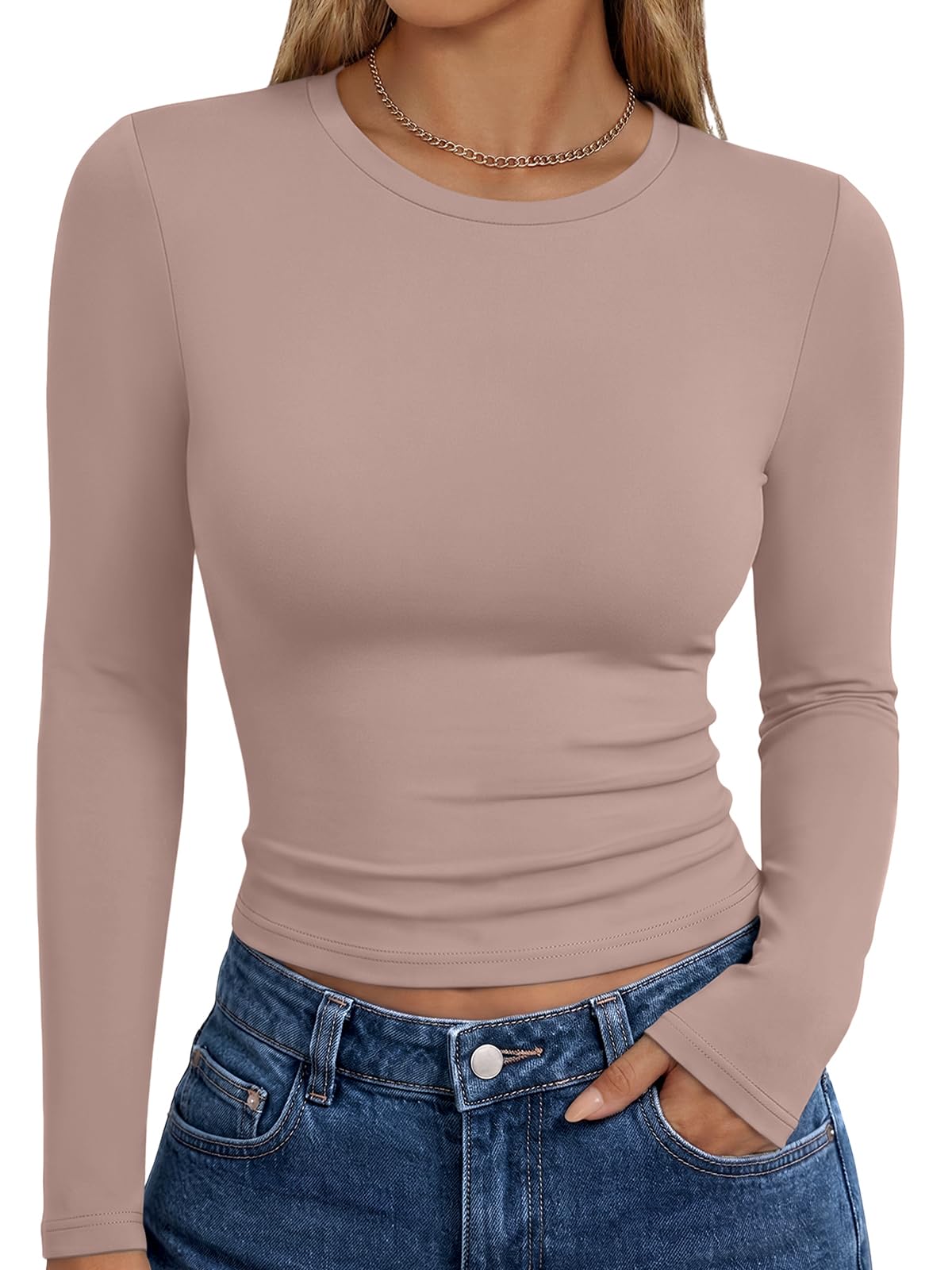 Long sleeve top paired with trousers in a casual outfit