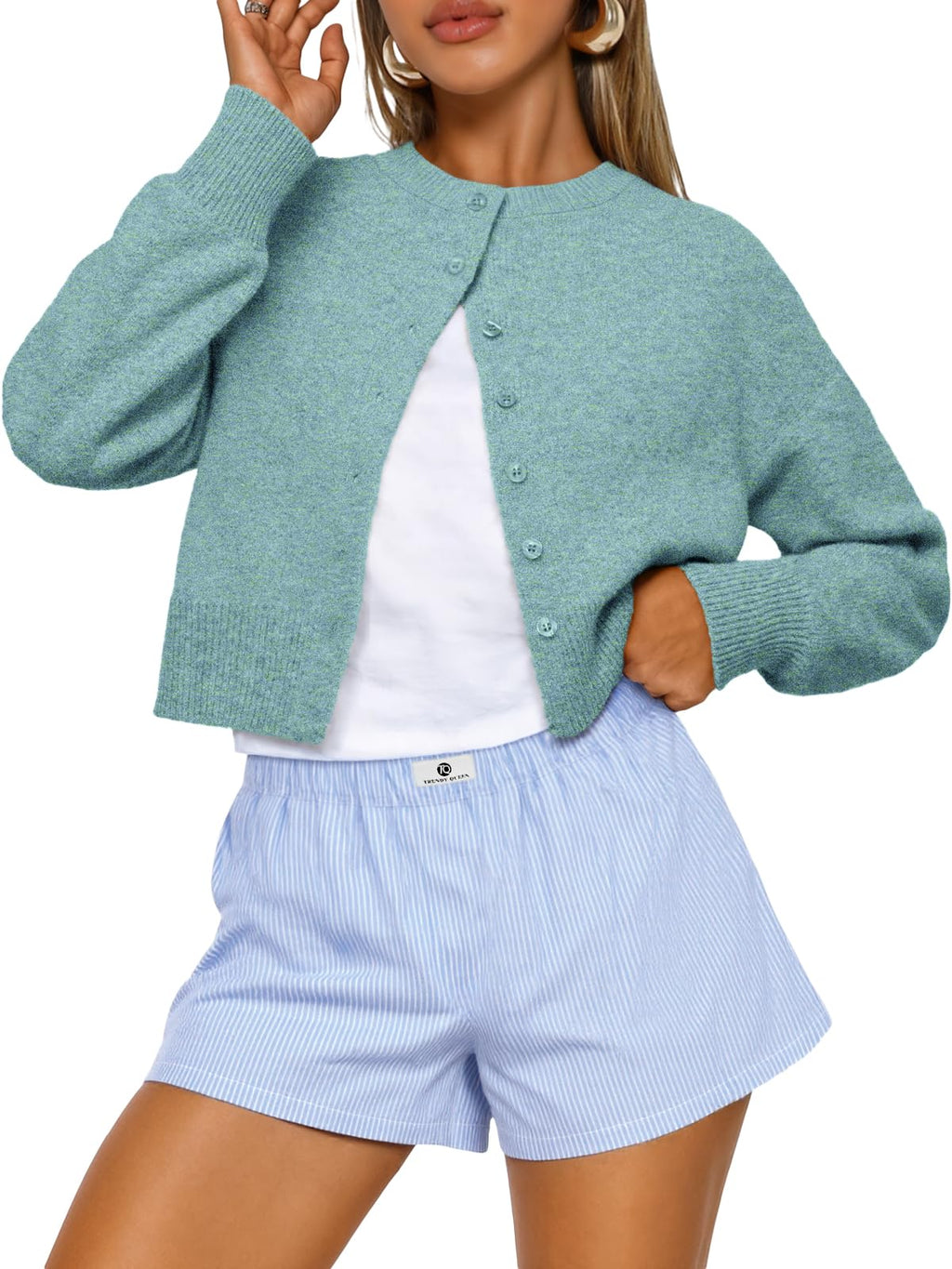 Cropped cardigan sweater for women shown buttoned up in a front view, fall fashion layering piece