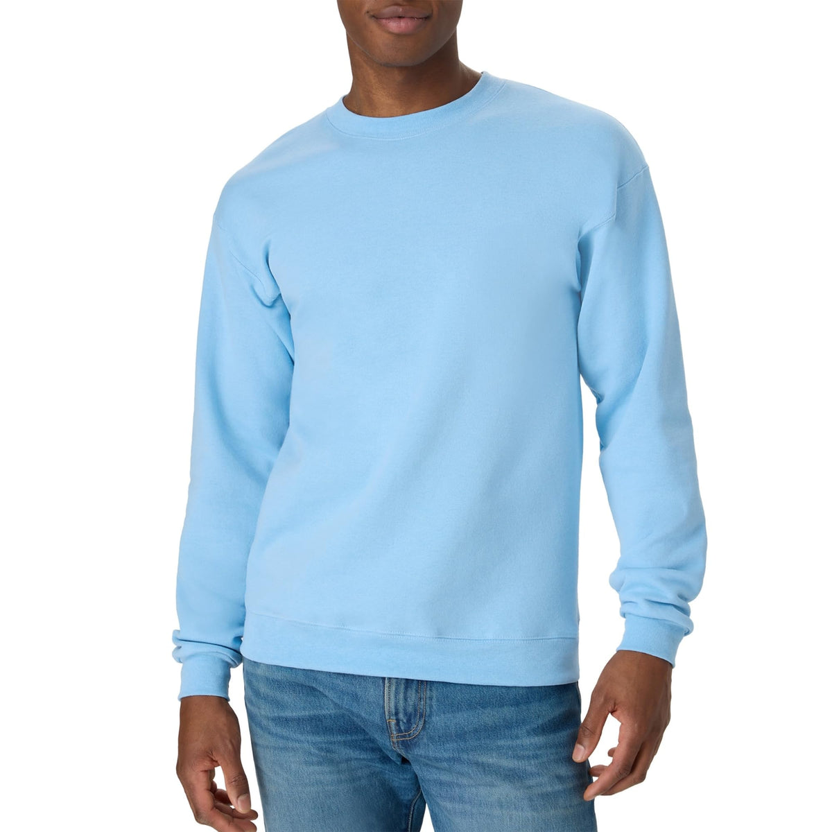 Model stretching in a men's fleece crewneck sweatshirt to show ease of movement