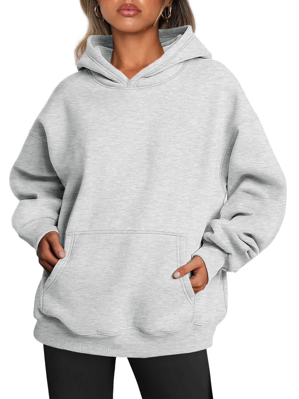 Oversized women's hoodie in a relaxed fit, front view showing the drawstring hood and kangaroo pocket