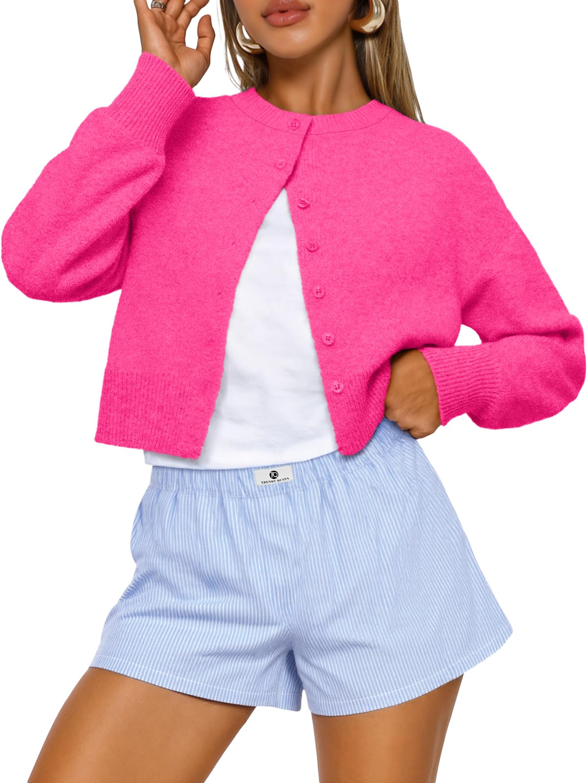 Hem and waistband detail of the cropped knit cardigan