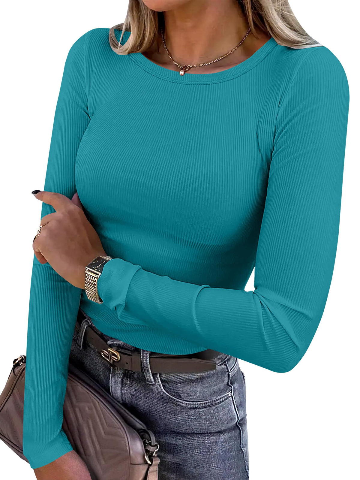 Women's long sleeve ribbed shirt shown in motion to show the fit