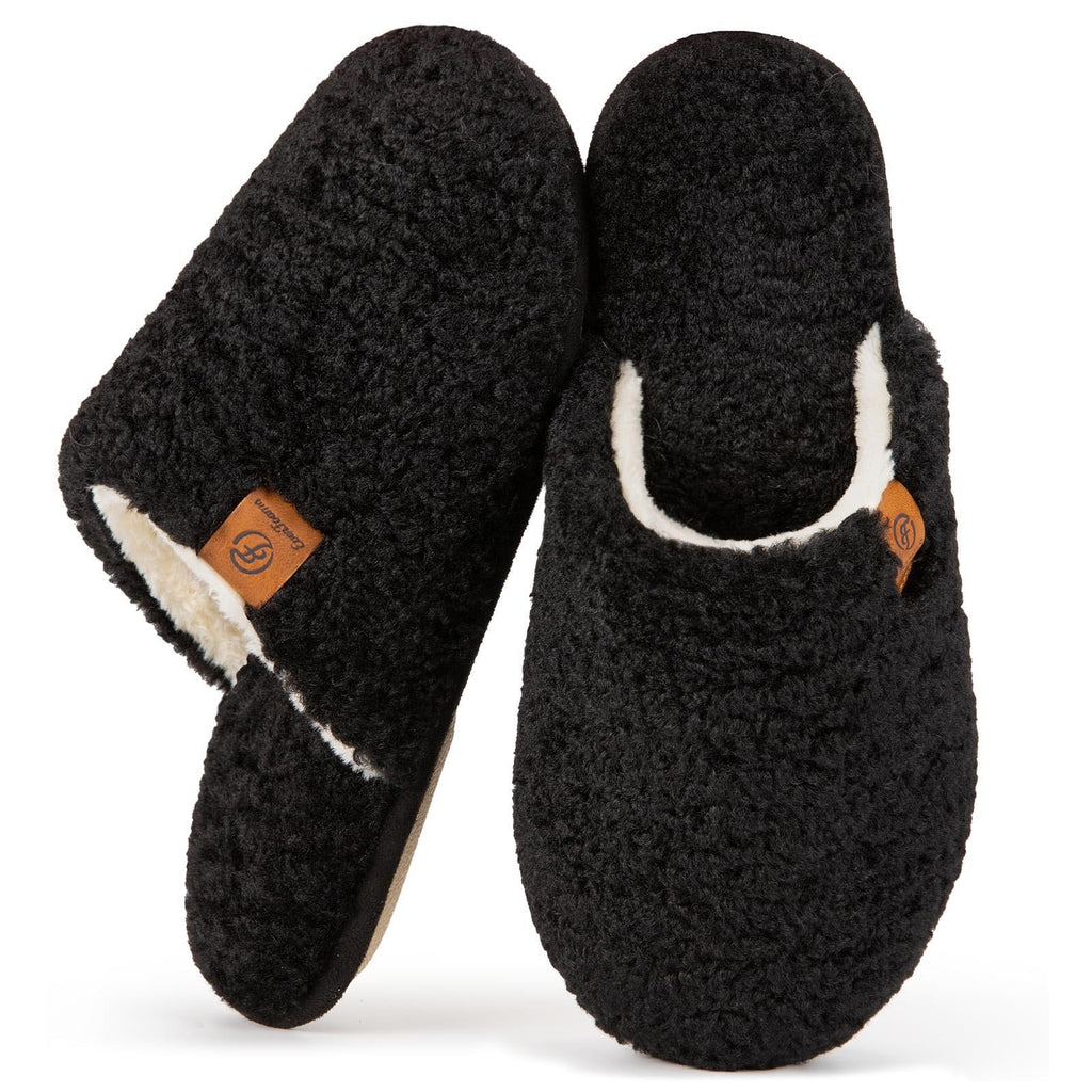 Close-up of the stitched trim along the edge of women's fuzzy slippers
