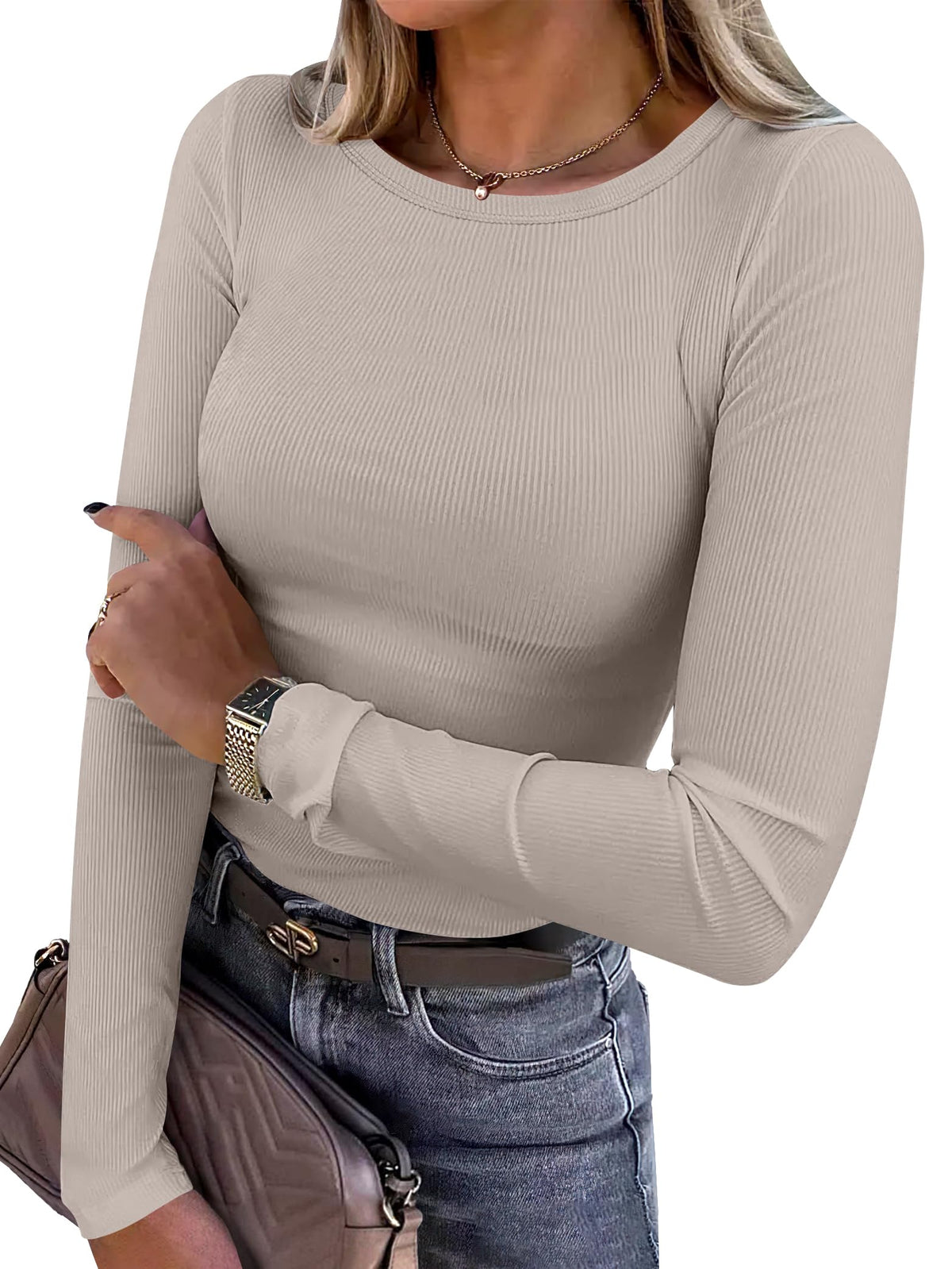 Ribbed fitted long sleeve top styled for layering under a coat