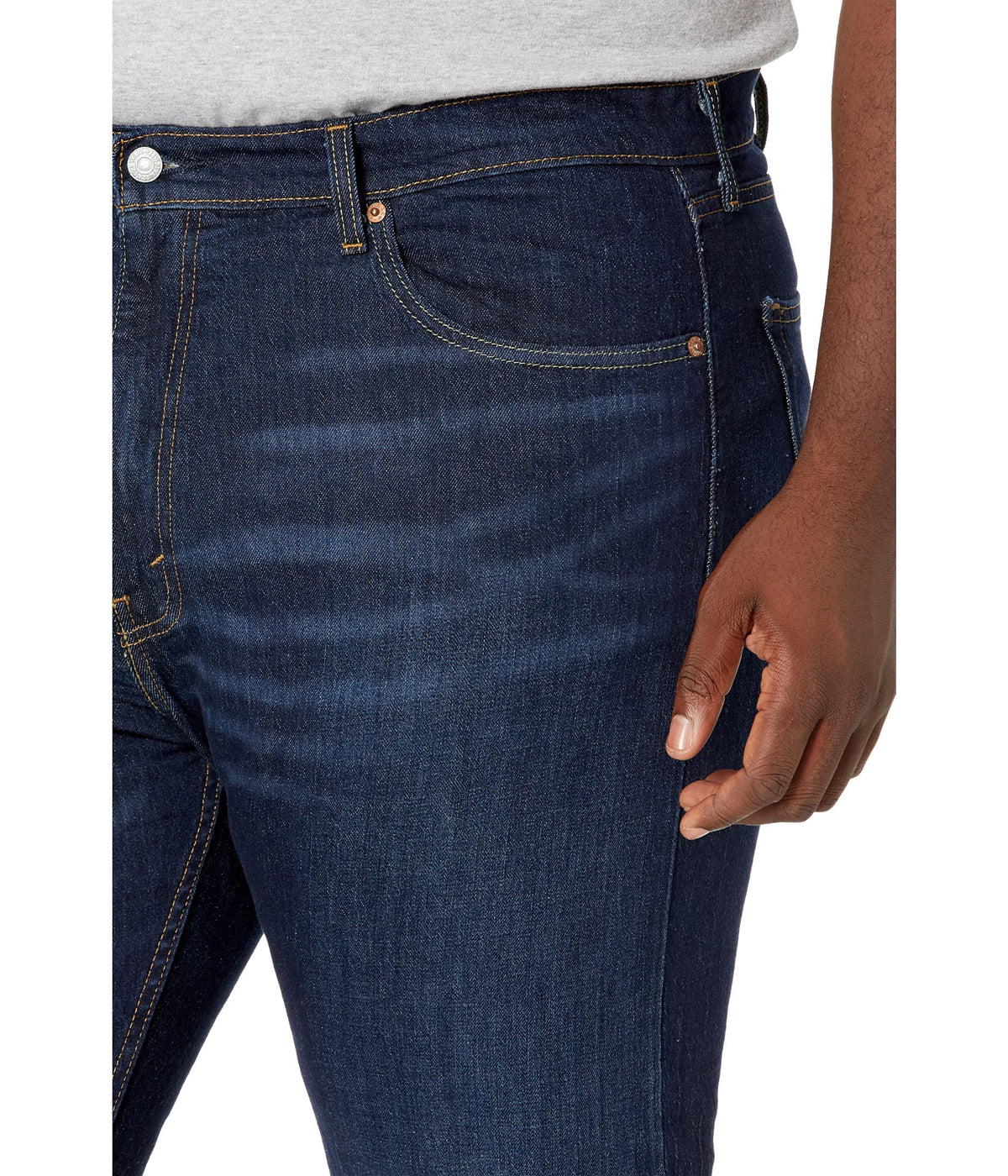 Men's 505 regular fit jeans in mid-blue, model walking to show the leg movement and fit