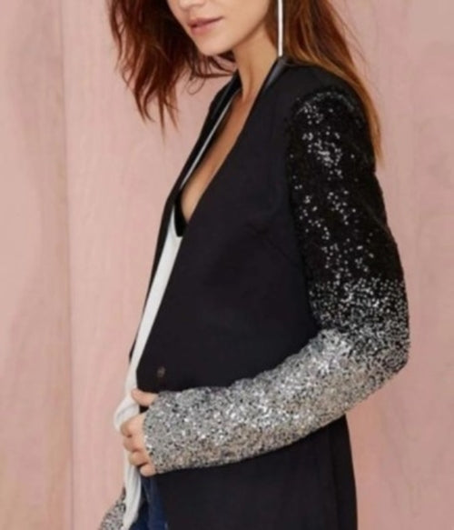 Black sequin-sleeve blazer shown from the side, slim tailored fit